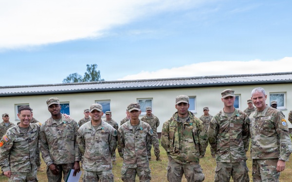 V Corps' Command Team Pose with Best Squad Team Winners