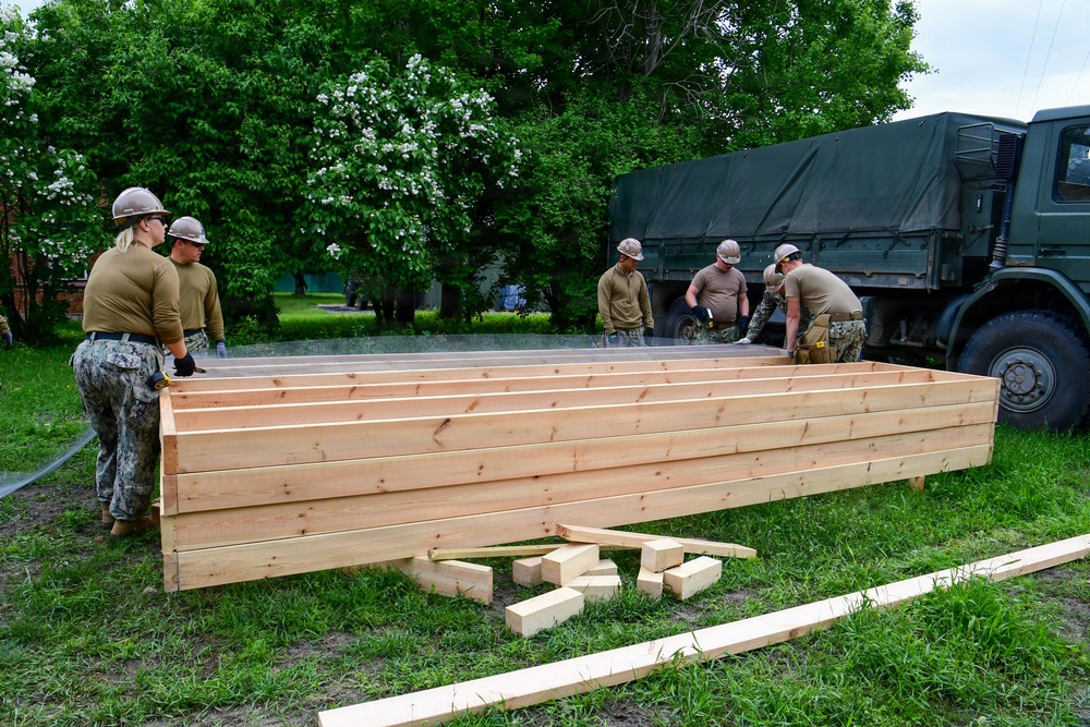 Naval Construction Battalion (NCB) 14 constructs Arctic Bee Huts during BALTOPS 2026