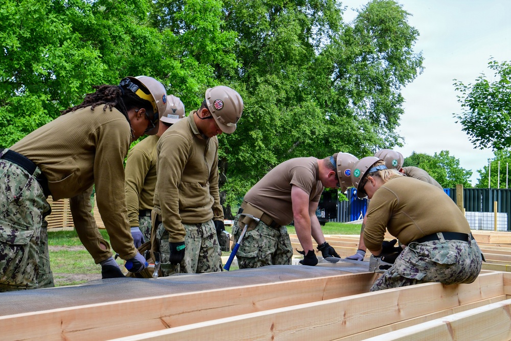 Naval Construction Battalion (NCB) 14 constructs Arctic Bee Huts during BALTOPS 2026