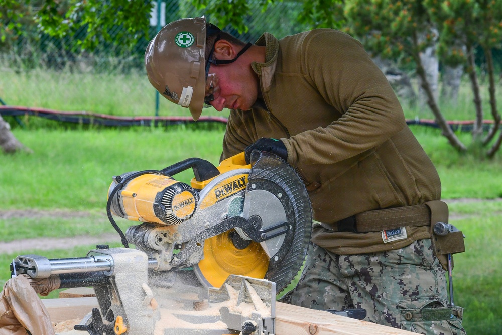 Naval Construction Battalion (NCB) 14 constructs Arctic Bee Huts during BALTOPS 2026