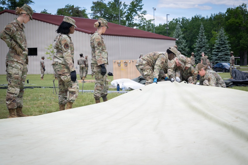 Airmen from the 181st Force Support Squadron conduct search and recovery training at Alpena Combat Readiness Training Center