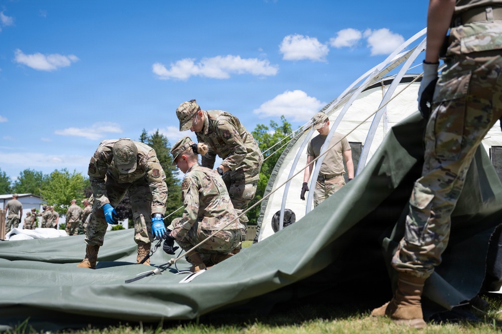 Airmen from the 181st Force Support Squadron conduct search and recovery training at Alpena Combat Readiness Training Center