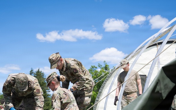 Airmen from the 181st Force Support Squadron conduct search and recovery training at Alpena Combat Readiness Training Center