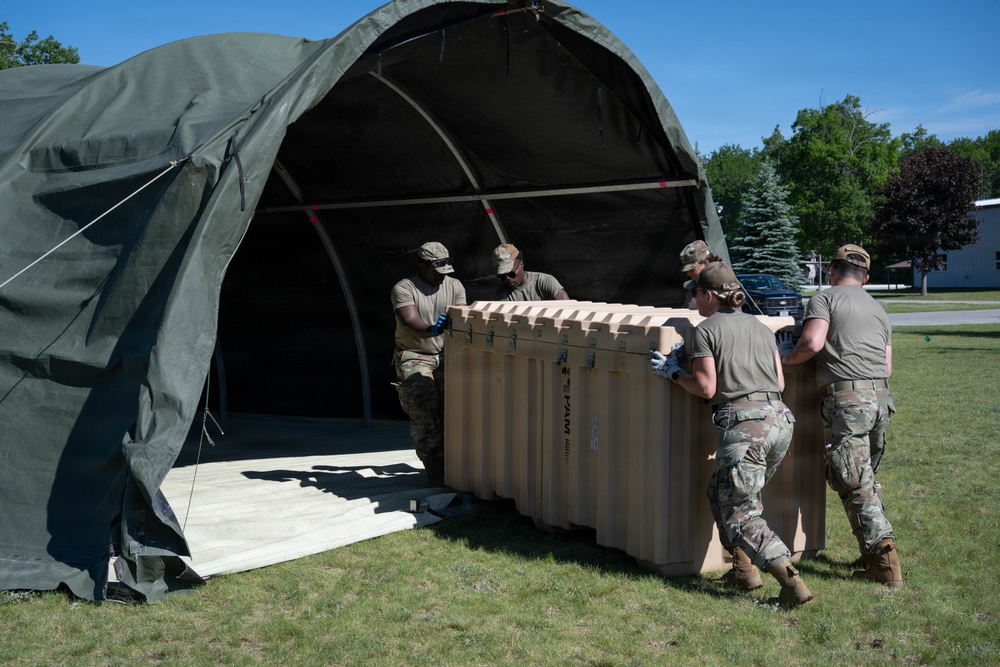 Airmen from the 181st Force Support Squadron conduct search and recovery training at Alpena Combat Readiness Training Center