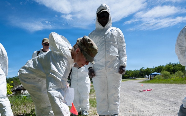 Airmen from the 181st Force Support Squadron conduct search and recovery training at Alpena Combat Readiness Training Center