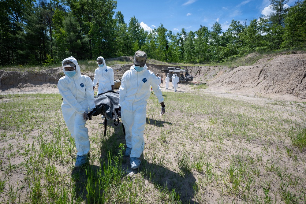 Airmen from the 181st Force Support Squadron conduct search and recovery training at Alpena Combat Readiness Training Center