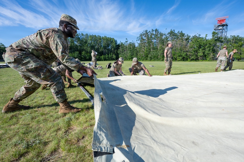 Airmen from the 181st Force Support Squadron conduct search and recovery training at Alpena Combat Readiness Training Center