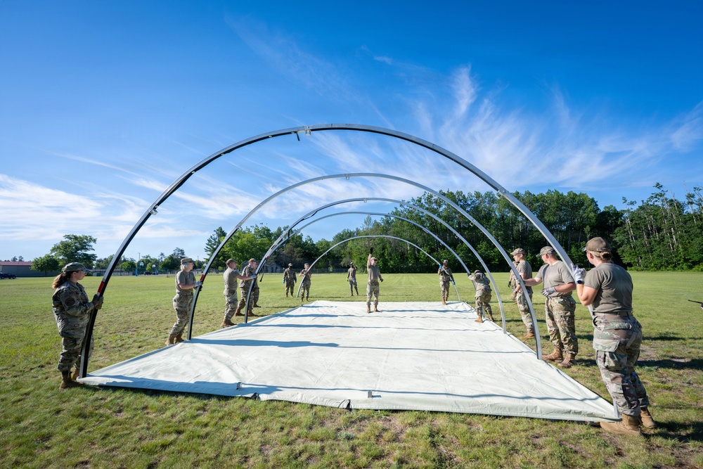 Airmen from the 181st Force Support Squadron conduct search and recovery training at Alpena Combat Readiness Training Center