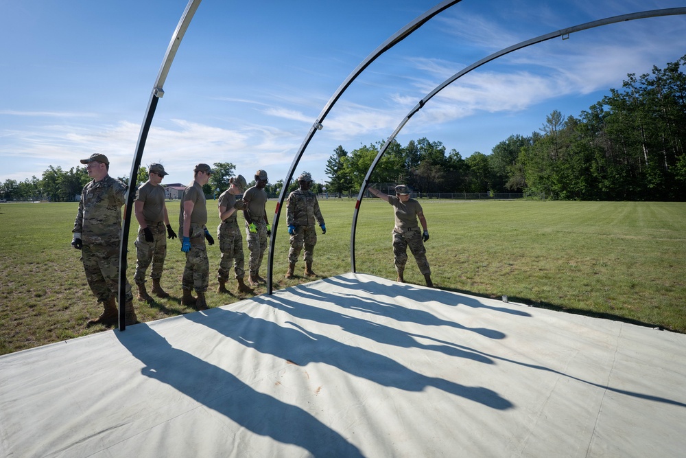 Airmen from the 181st Force Support Squadron conduct search and recovery training at Alpena Combat Readiness Training Center