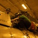 USS George H.W. Bush maintain an MH-60R Sea Hawk
