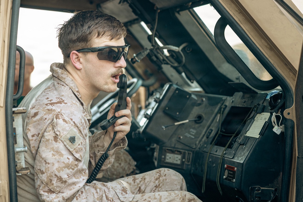 U.S. Marines and Sailors Depart to a Position Area for Artillery