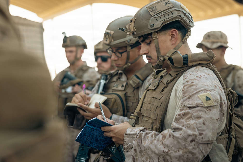 U.S. Marines and Sailors Depart to a Position Area for Artillery