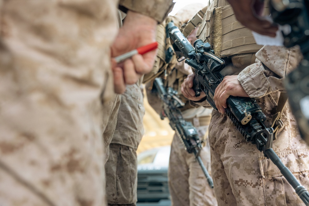 U.S. Marines and Sailors Depart to a Position Area for Artillery