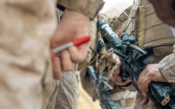 U.S. Marines and Sailors Depart to a Position Area for Artillery