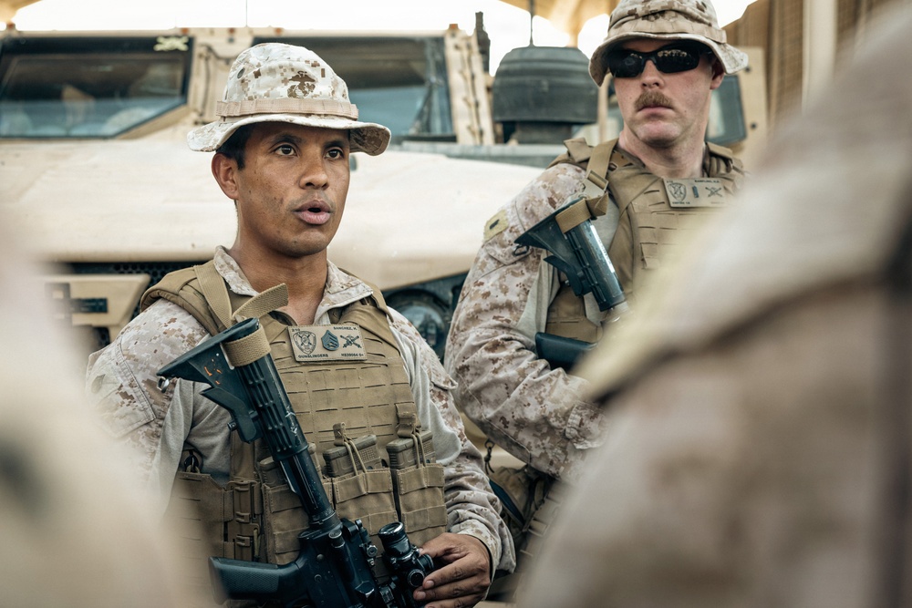 U.S. Marines and Sailors Depart to a Position Area for Artillery