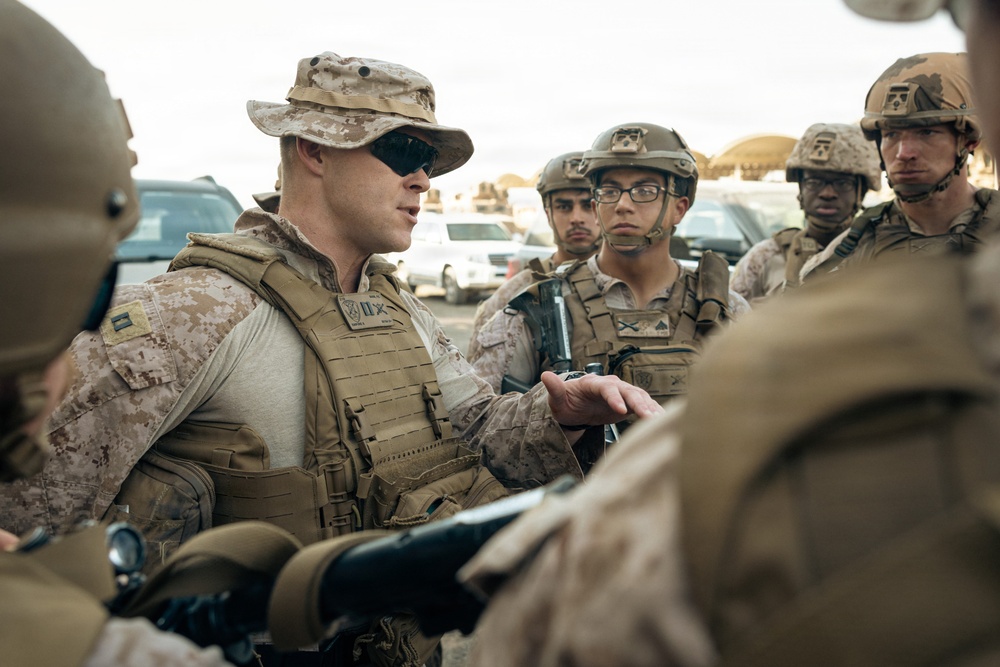 U.S. Marines and Sailors Depart to a Position Area for Artillery