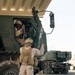 U.S. Marines and Sailors Depart to a Position Area for Artillery
