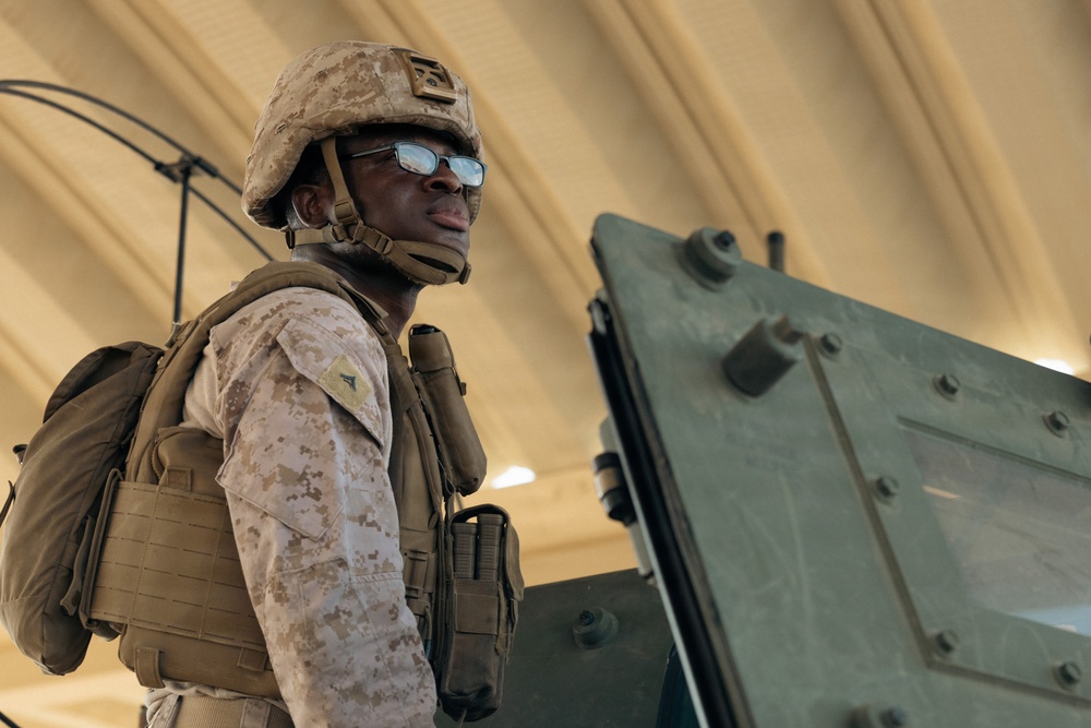 U.S. Marines and Sailors Depart to a Position Area for Artillery