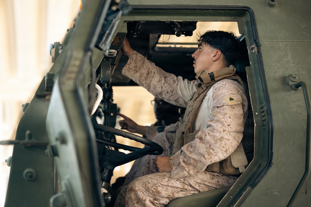 U.S. Marines and Sailors Depart to a Position Area for Artillery