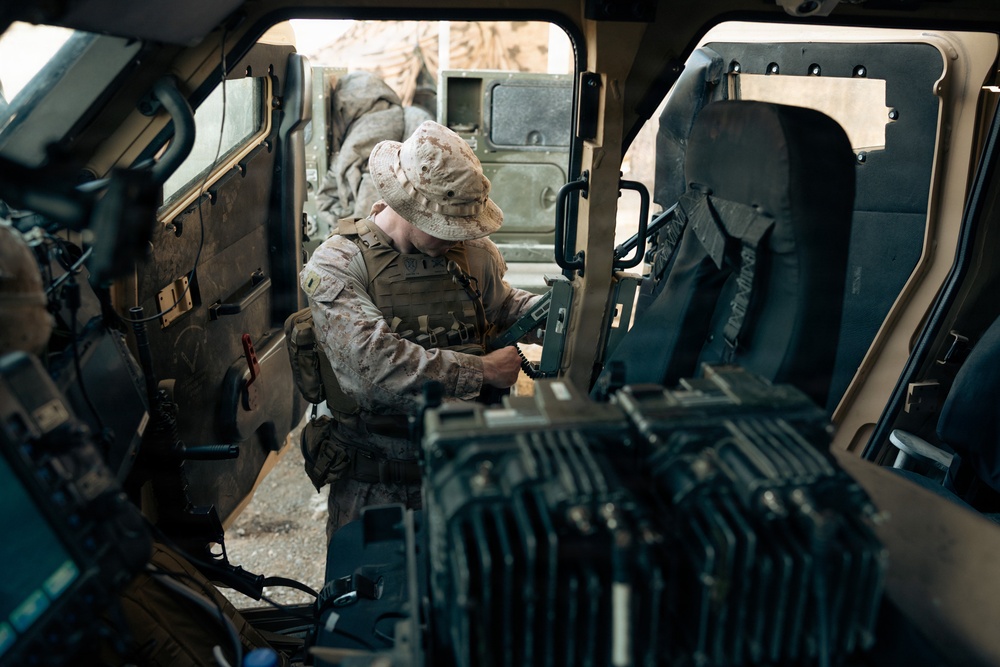 U.S. Marines and Sailors Depart to a Position Area for Artillery