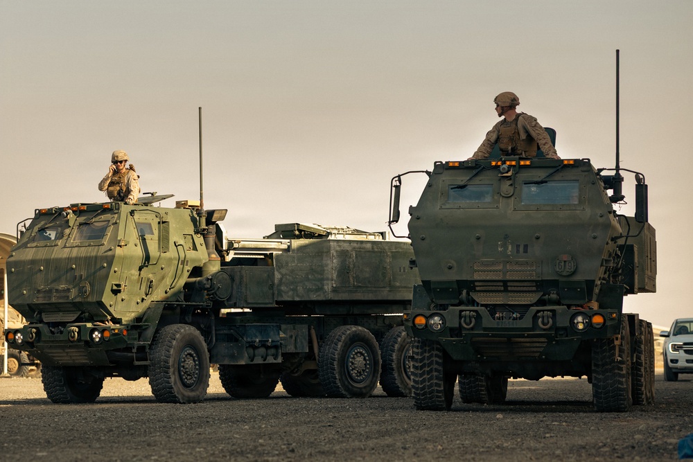 U.S. Marines and Sailors Depart to a Position Area for Artillery