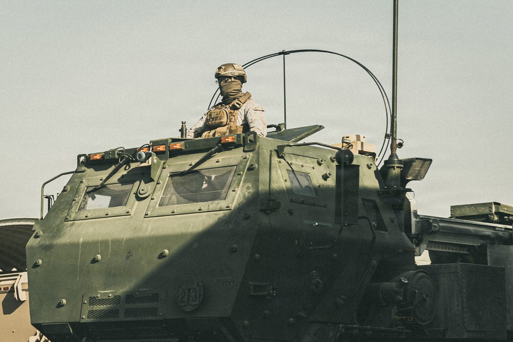 U.S. Marines and Sailors Depart to a Position Area for Artillery