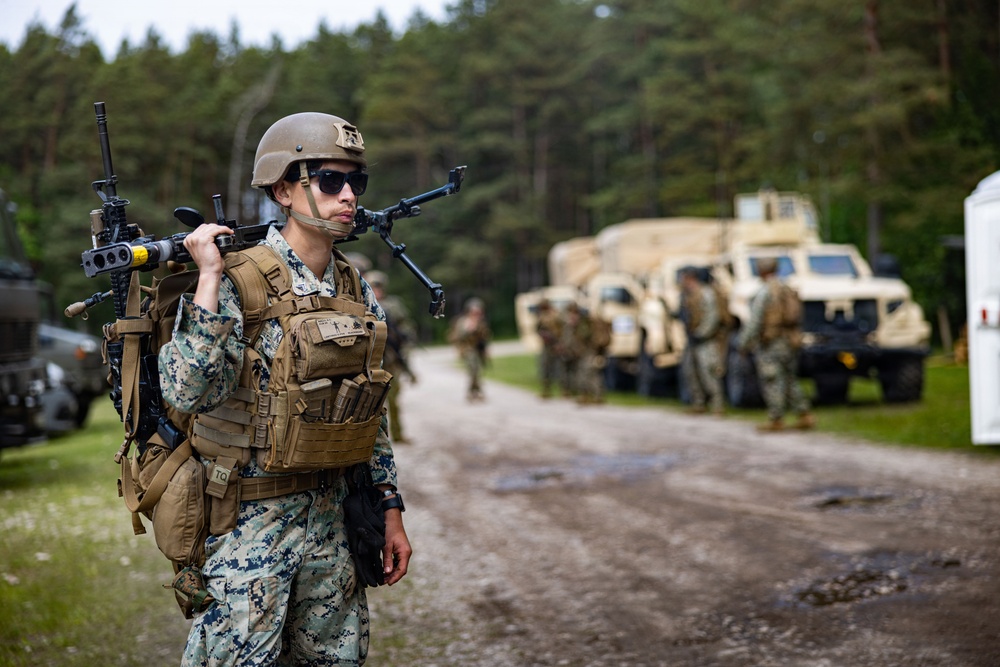 U.S. Marine Corps combat engineers conduct beach security patrol