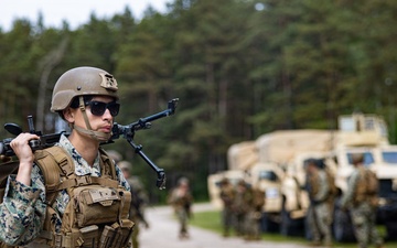 U.S. Marine Corps combat engineers conduct beach security patrol