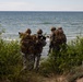 U.S. Marine Corps combat engineers conduct beach security patrol