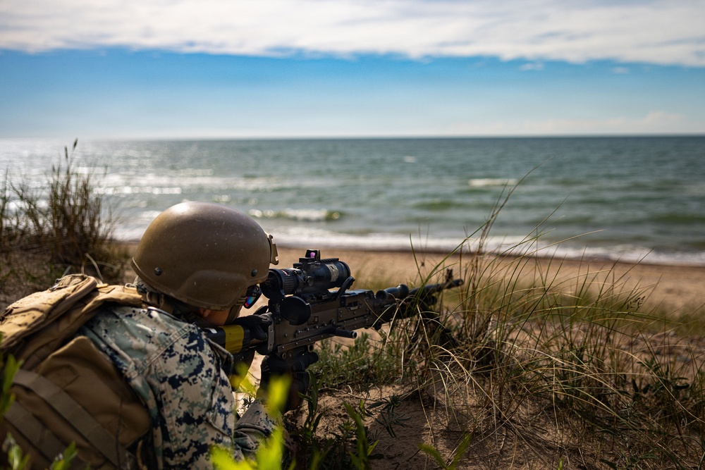 U.S. Marine Corps combat engineers conduct beach security patrol