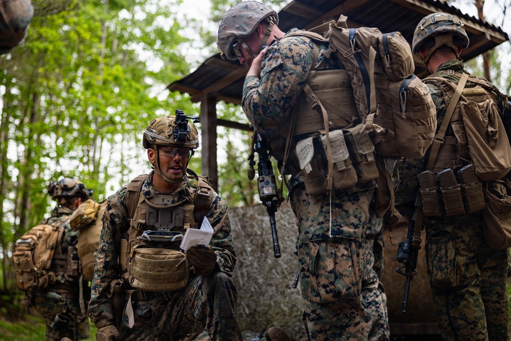 U.S. Marine Corps combat engineers conduct beach security patrol