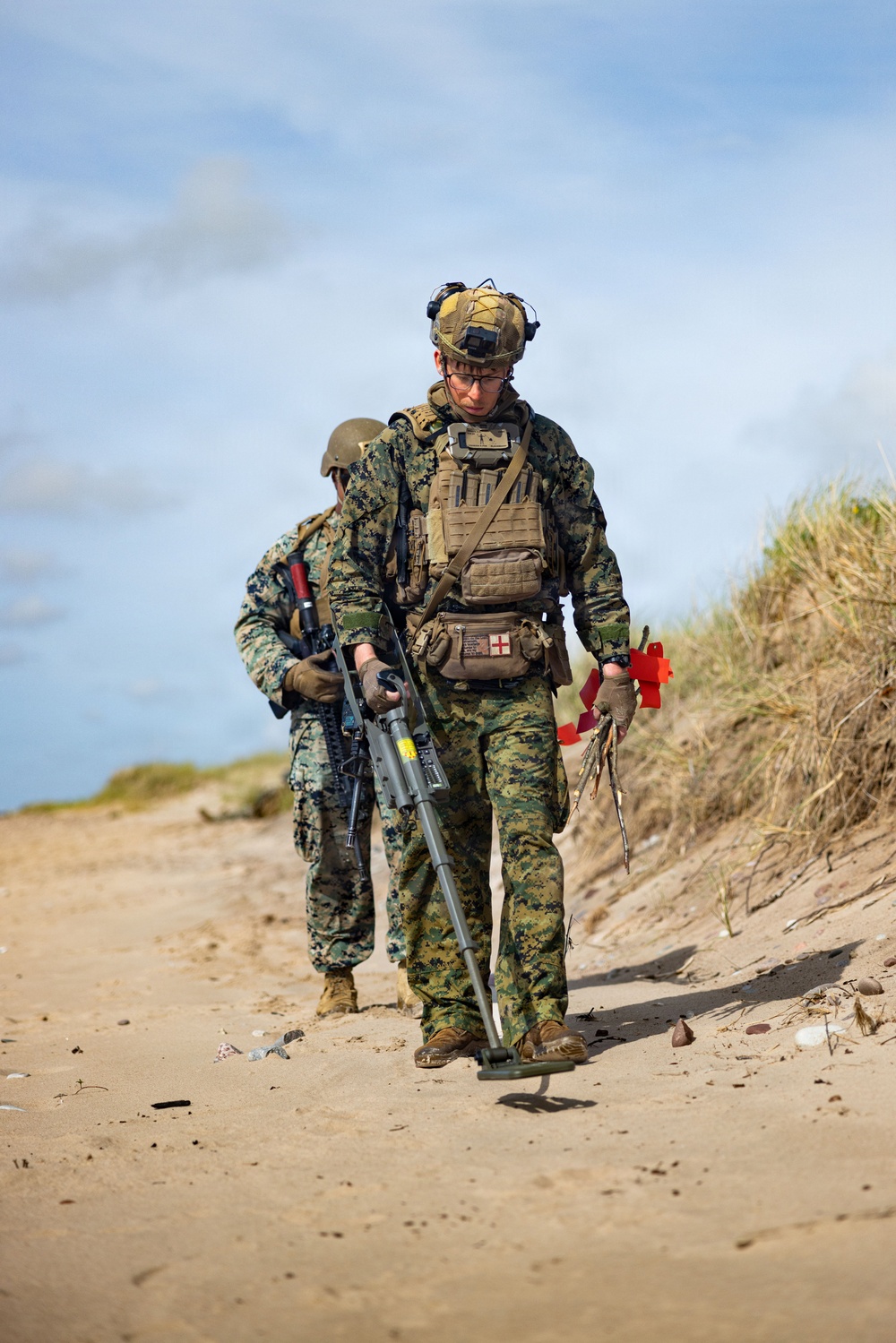 U.S. Marine Corps combat engineers conduct beach security patrol