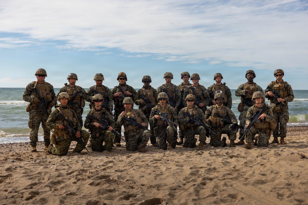 U.S. Marine Corps combat engineers conduct beach security patrol