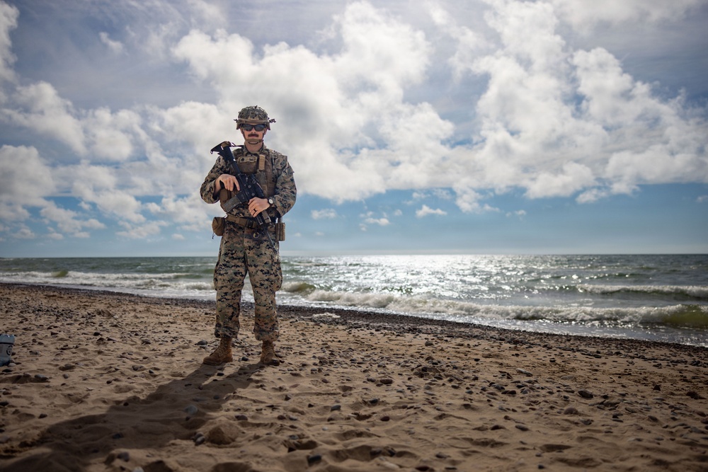 U.S. Marine Corps combat engineers conduct beach security patrol