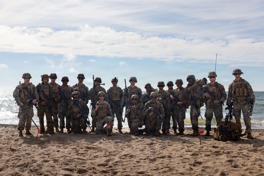 U.S. Marine Corps combat engineers conduct beach security patrol