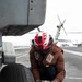 USS George H.W. Bush chains down an MH-60R Sea Hawk