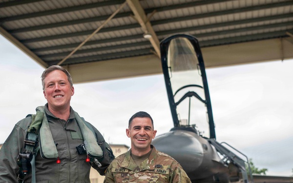 Secretary of the Army, Hon. Dan Driscoll, re-enlists Soldier.