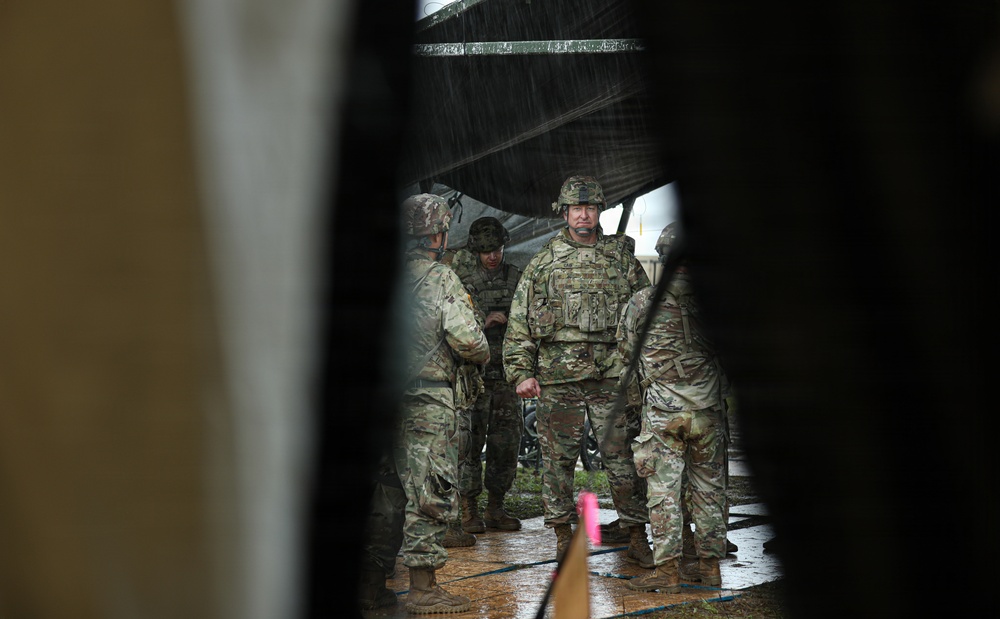 Generals, Distinguished Guests, and International Partners Tour Field Hospital During Operation Sentinel Justice