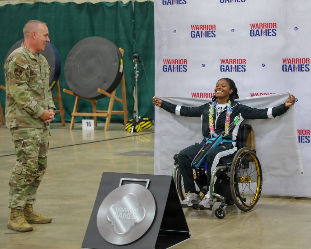 Athlete Celebrates Silver Medal Victory at Warrior Games 2026 Archery Competition