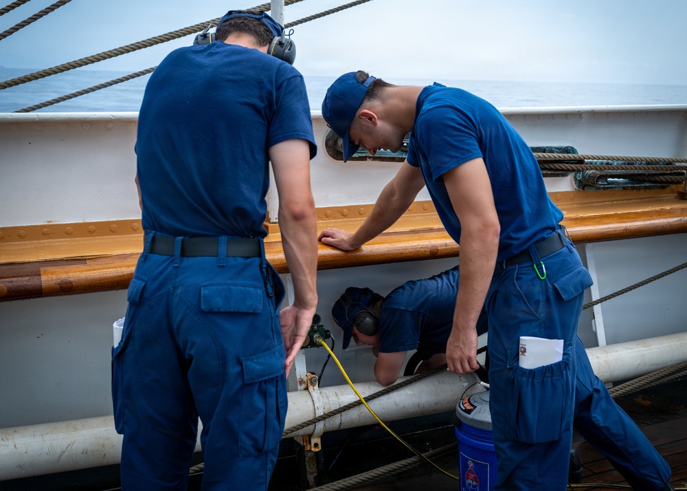 U.S. Coast Guard Academy cadets beautify the decks of the Cutter Eagle (WIX-327)