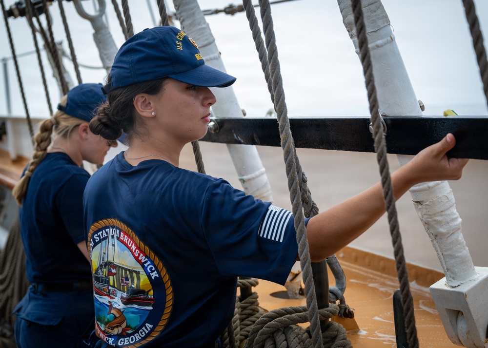 U.S. Coast Guard Academy cadets beautify the decks of the Cutter Eagle (WIX-327)