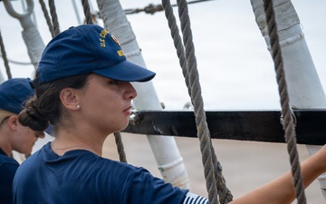 U.S. Coast Guard Academy cadets beautify the decks of the Cutter Eagle (WIX-327)