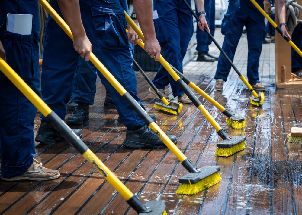 U.S. Coast Guard Academy cadets beautify the decks of the Cutter Eagle (WIX-327)