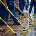 U.S. Coast Guard Academy cadets beautify the decks of the Cutter Eagle (WIX-327)