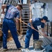 U.S. Coast Guard Academy cadets beautify the decks of the Cutter Eagle (WIX-327)