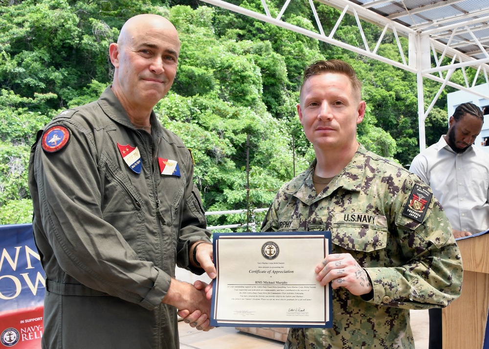 NAVSUP FLC Yokosuka’s (FLCY) Logistics Specialist 1st Class Ariel Aaron Lim was recognized for his outstanding efforts in promoting awareness and collecting donations in support of the Navy-Marine Corps Relief Society (NMCRS).