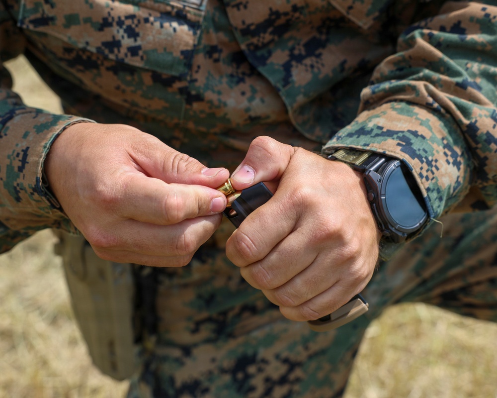 U.S. Marines conduct an M18 pistol range during Sea Breeze 26 in Romania