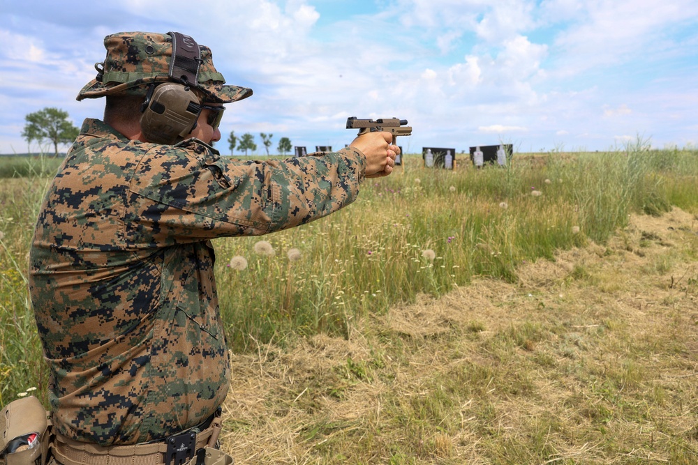 U.S. Marines conduct an M18 pistol range during Sea Breeze 26 in Romania