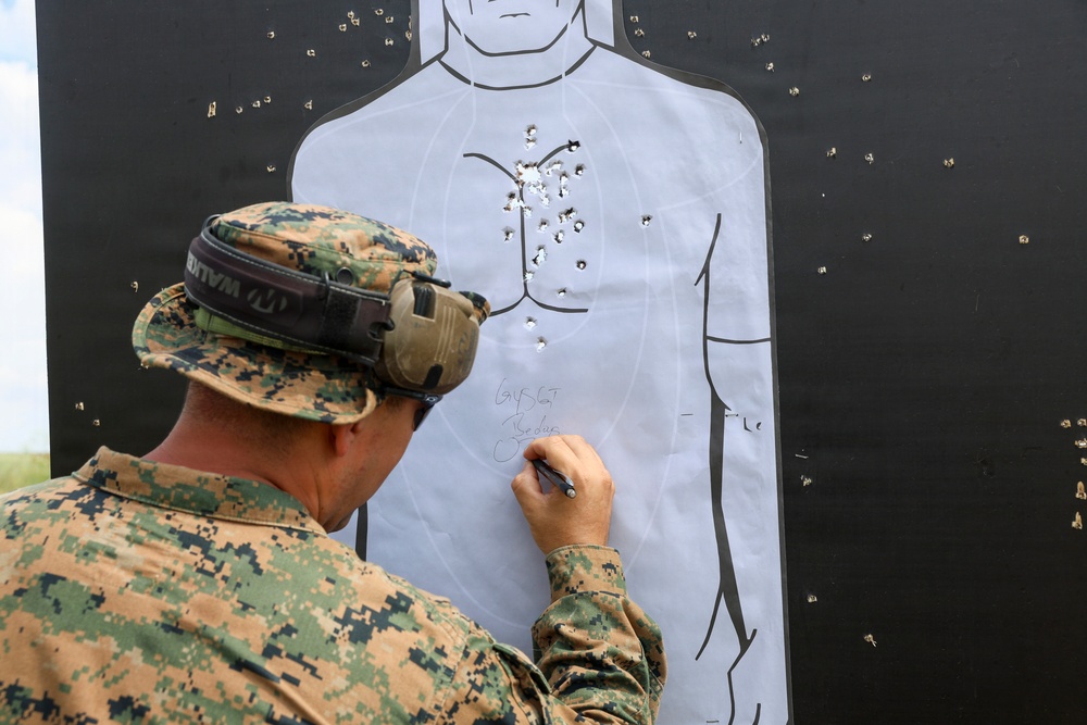 U.S. Marines conduct an M18 pistol range during Sea Breeze 26 in Romania
