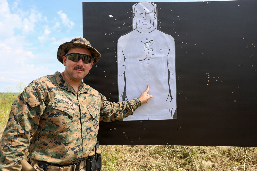 U.S. Marines conduct an M18 pistol range during Sea Breeze 26 in Romania